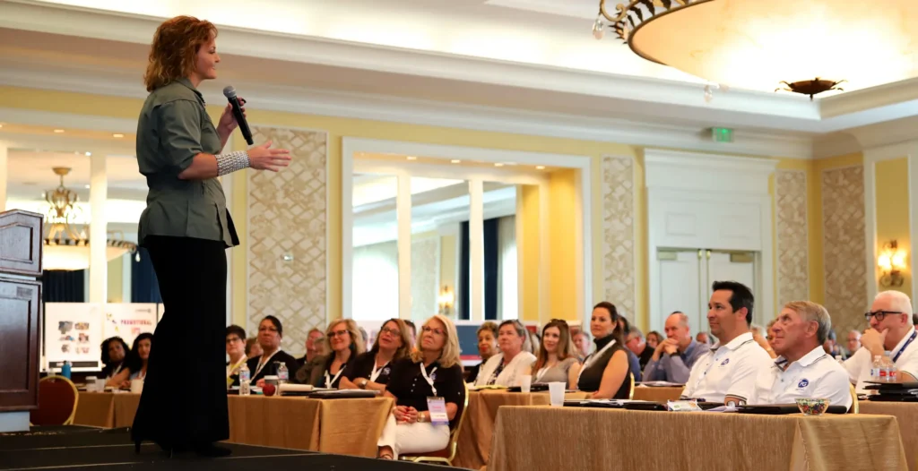 Elizabeth-McCormick-speaking-for-Corporate-Meeting-REV-scaled